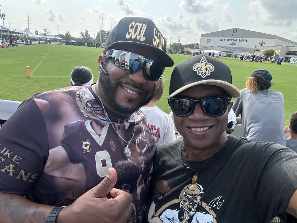 Whistle Monsta with a fan at Saints Training Camp